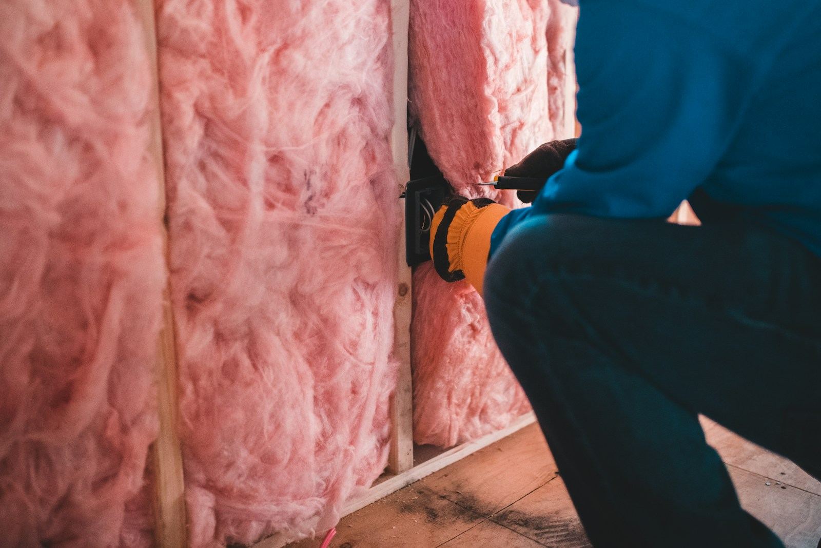 Insulation being installed during an interior remodel